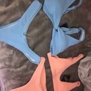 2 never used swimsuits size s both $25 for one $13